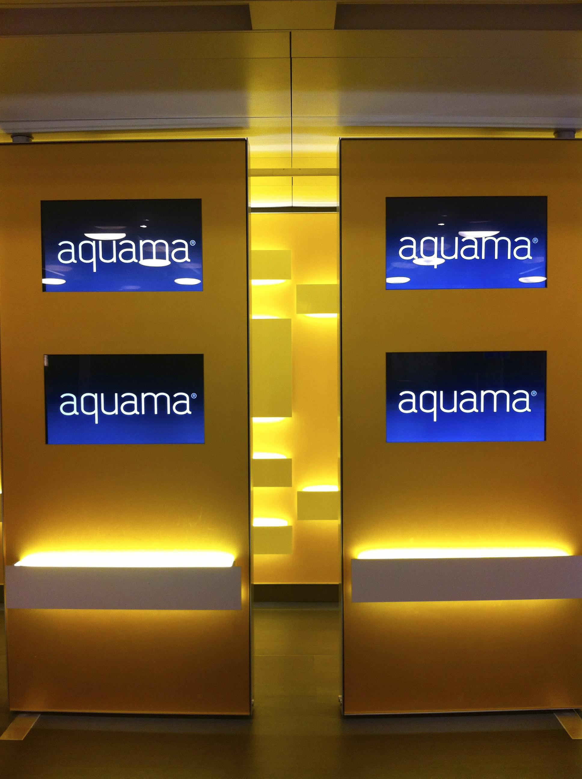 aquama displays on screen TV at airport